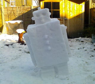 Illustration for article titled These geeky snowmen turn their yards into a weirder winter wonderland